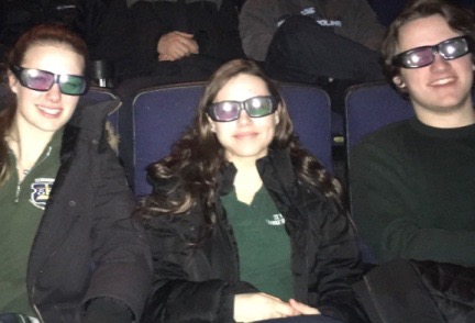 Three students sit with 3D glasses on.